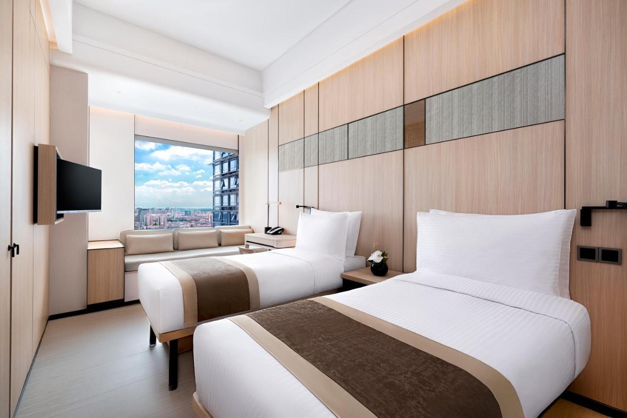 Harbour Plaza Metropolitan Шанхай Экстерьер фото